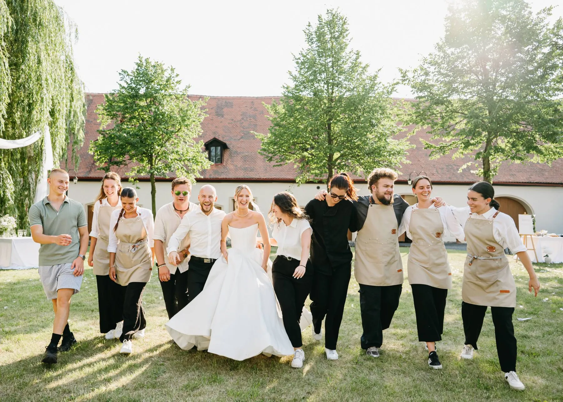 Our team with the newlyweds at a wedding reception